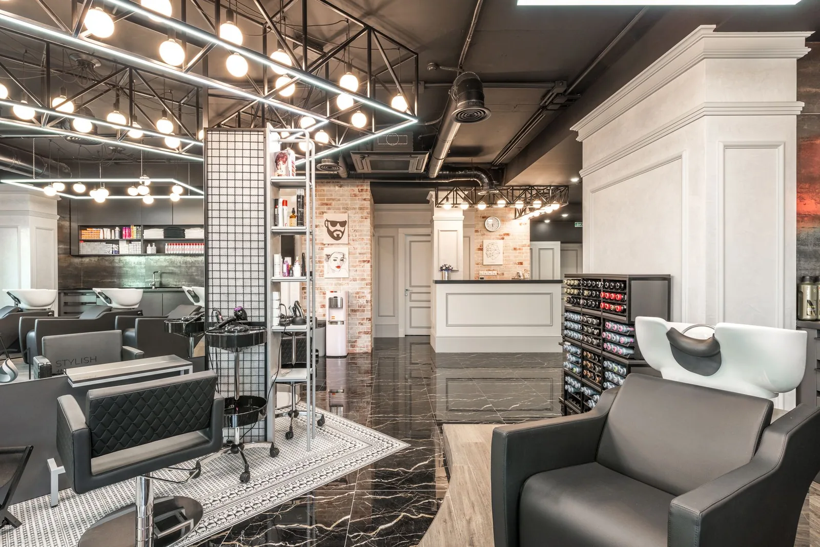 Modern hair salon reception desk where CRM software helps manage client bookings and appointments